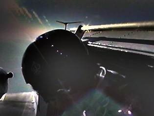 Exiting a Twin Otter, 2000. From video by Reno Ross.
